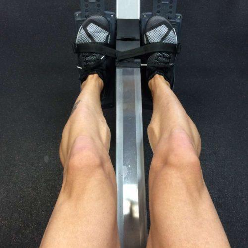 feet of young man doing exercises