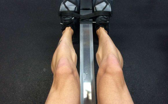 feet of young man doing exercises