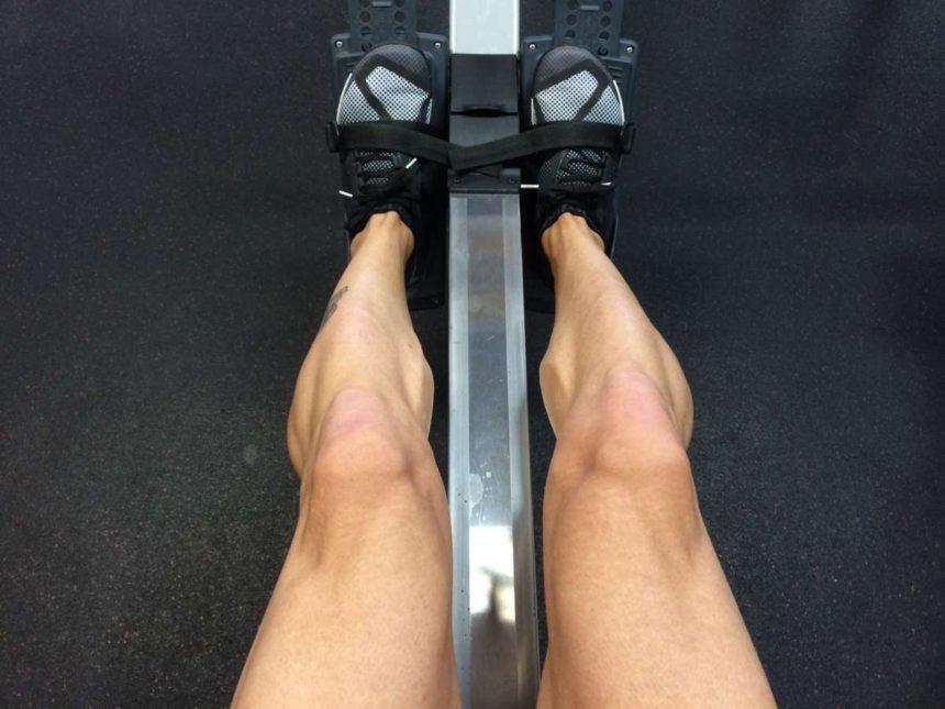 feet of young man doing exercises